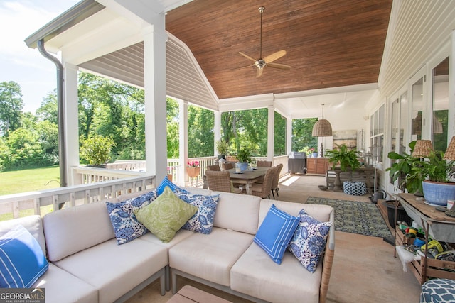 view of patio / terrace with outdoor dining space, a ceiling fan, and an outdoor living space