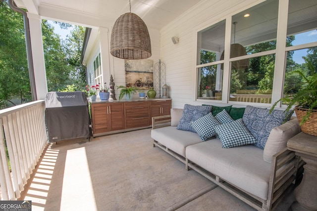 view of patio / terrace with grilling area and a porch
