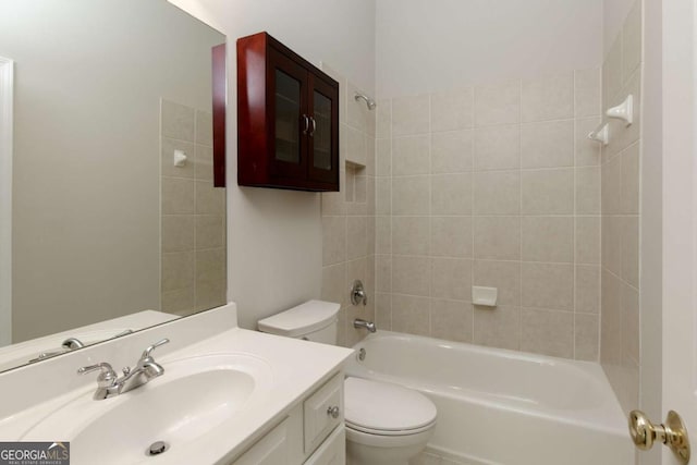 full bath featuring toilet, vanity, and shower / bathtub combination