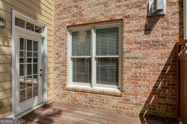 exterior space featuring brick siding