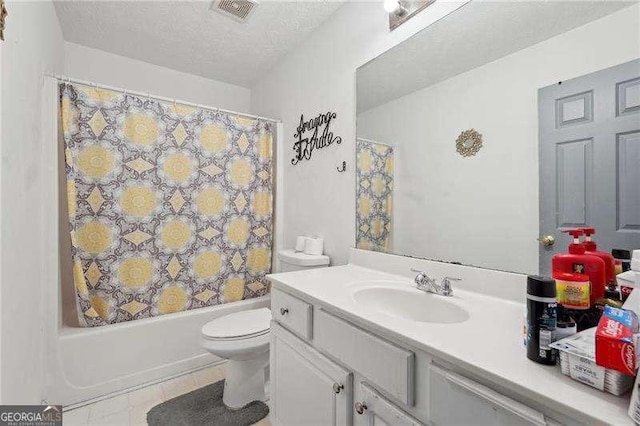 415 Clairidge Ln SW, Lawrenceville, GA 30046 - full bath featuring a textured ceiling, toilet, visible vents, shower / tub combo with curtain, and vanity