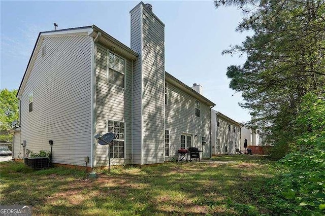415 Clairidge Ln SW, Lawrenceville, GA 30046 - view of property exterior featuring a chimney
