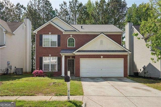 415 Clairidge Ln SW, Lawrenceville, GA 30046 - traditional-style home featuring a garage, brick siding, a front lawn, and concrete driveway