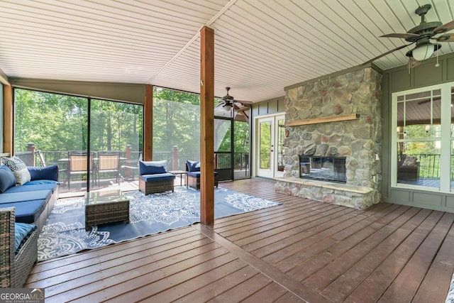 210 Lake Pines Rd, Jackson, GA 30233 - sunroom with a wealth of natural light, ceiling fan, and an outdoor living space with a fireplace