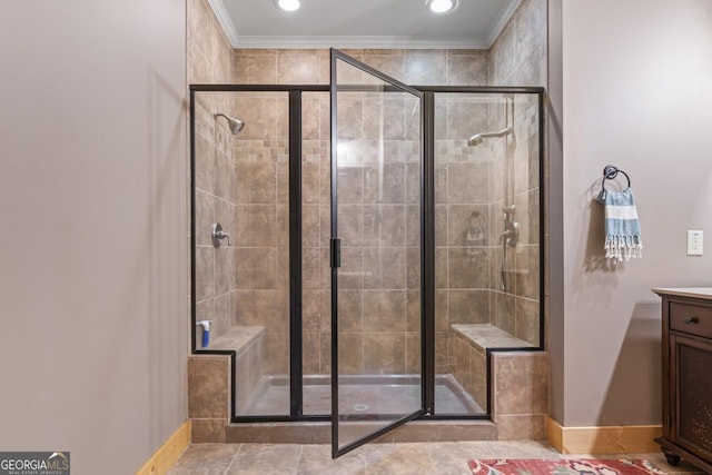 210 Lake Pines Rd, Jackson, GA 30233 - bathroom featuring crown molding, a stall shower, vanity, and baseboards