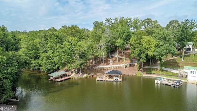 210 Lake Pines Rd, Jackson, GA 30233 - rear view of house with a lawn, stairway, a chimney, and a sunroom