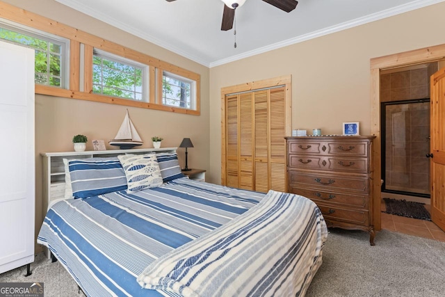 210 Lake Pines Rd, Jackson, GA 30233 - bedroom with ornamental molding, a ceiling fan, carpet floors, and a closet