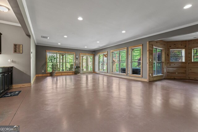 210 Lake Pines Rd, Jackson, GA 30233 - unfurnished living room featuring concrete floors, visible vents, recessed lighting, and ornamental molding