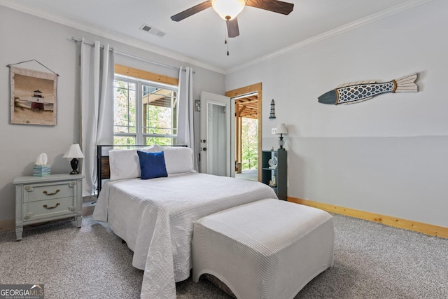 210 Lake Pines Rd, Jackson, GA 30233 - bedroom with crown molding, carpet flooring, visible vents, ceiling fan, and baseboards