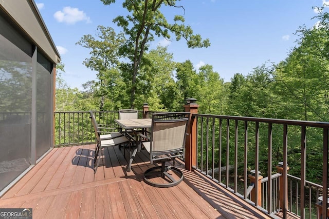 210 Lake Pines Rd, Jackson, GA 30233 - deck with outdoor dining space and a view of trees