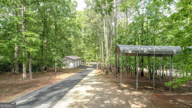210 Lake Pines Rd, Jackson, GA 30233 - exterior space with driveway and a forest view