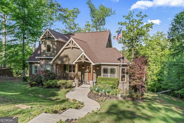 210 Lake Pines Rd, Jackson, GA 30233 - craftsman inspired home featuring a front lawn and stone siding