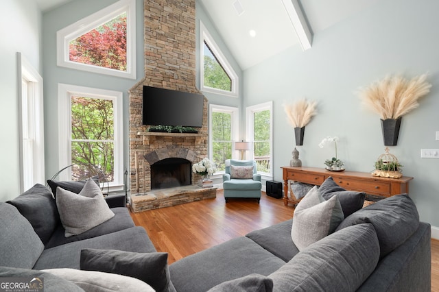 3190 Shumard Way, Marietta, GA 30064 - living area featuring a fireplace, wood finished floors, beam ceiling, and high vaulted ceiling