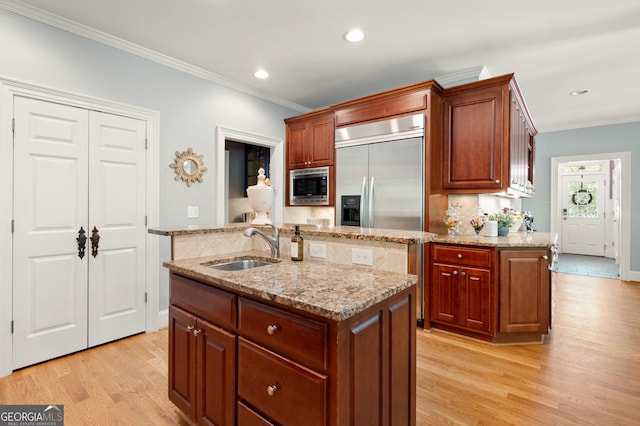 3190 Shumard Way, Marietta, GA 30064 - kitchen with built in appliances, crown molding, a sink, and light wood-style flooring