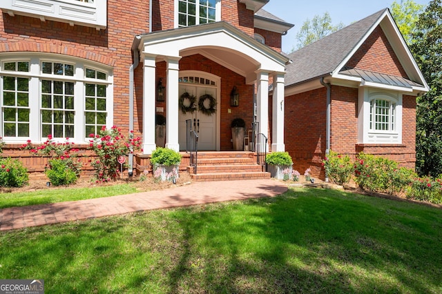 3190 Shumard Way, Marietta, GA 30064 - property entrance with a shingled roof, brick siding, and a yard
