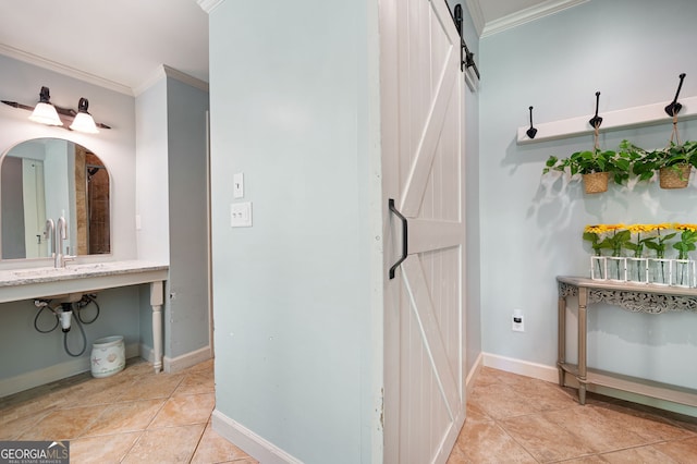 3190 Shumard Way, Marietta, GA 30064 - bathroom featuring baseboards, ornamental molding, tile patterned flooring, and a sink