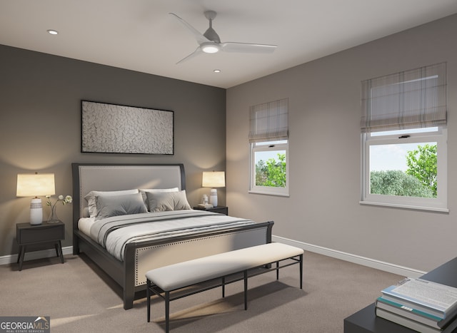 bedroom featuring a ceiling fan, baseboards, and light carpet