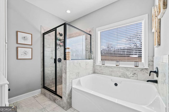 104 Federal Path, Temple, GA 30179 - full bathroom featuring a garden tub, a shower stall, and marble look tiles