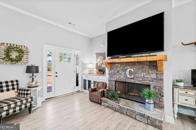 104 Federal Path, Temple, GA 30179 - living room with wood finished floors, crown molding, and a fireplace