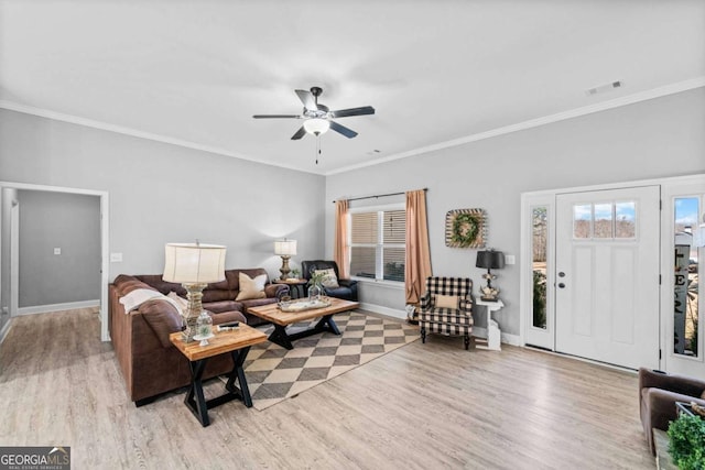 104 Federal Path, Temple, GA 30179 - living room featuring light wood-type flooring, a ceiling fan, and ornamental molding