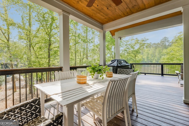 1630 Dogwood Dr, Greensboro, GA 30642 - wooden terrace with outdoor dining area and ceiling fan