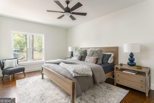 1630 Dogwood Dr, Greensboro, GA 30642 - bedroom featuring baseboards, a ceiling fan, and dark wood-style floors