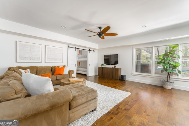 1630 Dogwood Dr, Greensboro, GA 30642 - living room featuring a barn door, recessed lighting, a ceiling fan, baseboards, and dark wood-style flooring