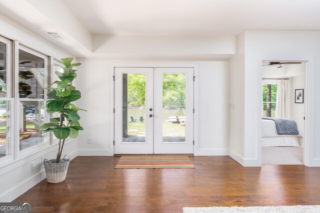 1630 Dogwood Dr, Greensboro, GA 30642 - entryway with visible vents, baseboards, french doors, and wood finished floors