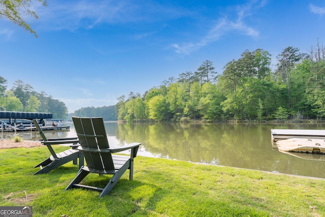 1630 Dogwood Dr, Greensboro, GA 30642 - dock area featuring a wooded view, a yard, and a water view