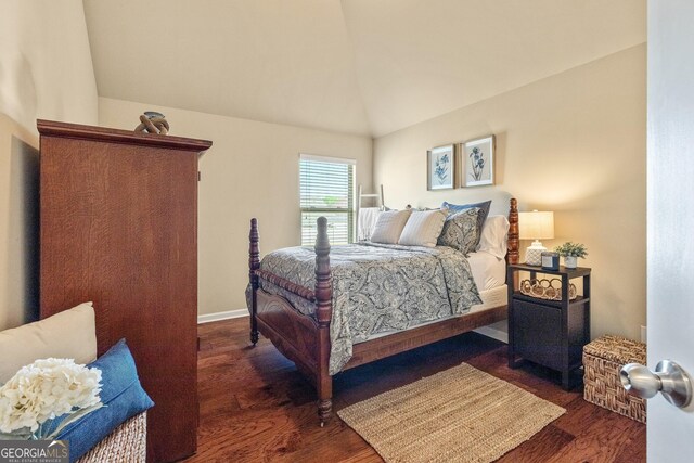 bedroom with wood finished floors, high vaulted ceiling, baseboards, and ceiling fan