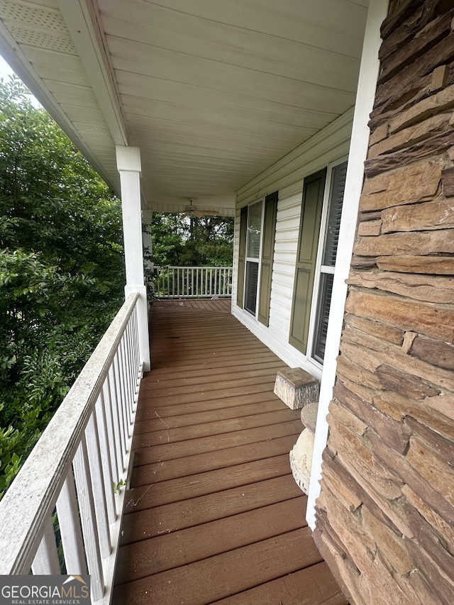 wooden deck featuring covered porch