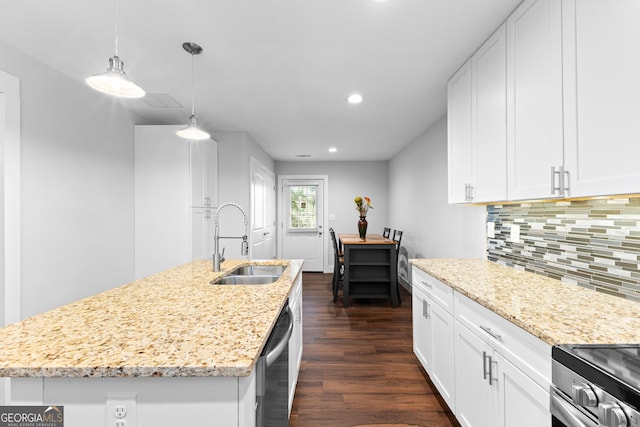 kitchen featuring white cabinetry, a sink, dark wood-type flooring, and recessed lighting