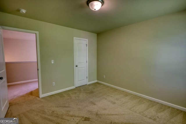11224 Aliyah Dr, Hampton, GA 30228 - unfurnished bedroom featuring carpet floors and baseboards