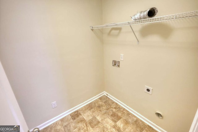 11224 Aliyah Dr, Hampton, GA 30228 - laundry area with baseboards, washer hookup, light floors, electric dryer hookup, and laundry area