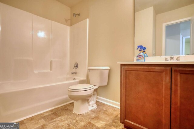 11224 Aliyah Dr, Hampton, GA 30228 - full bathroom with shower / washtub combination, baseboards, vanity, and toilet