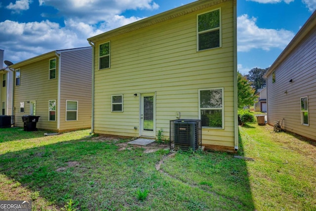 11224 Aliyah Dr, Hampton, GA 30228 - back of property with a yard and central air condition unit