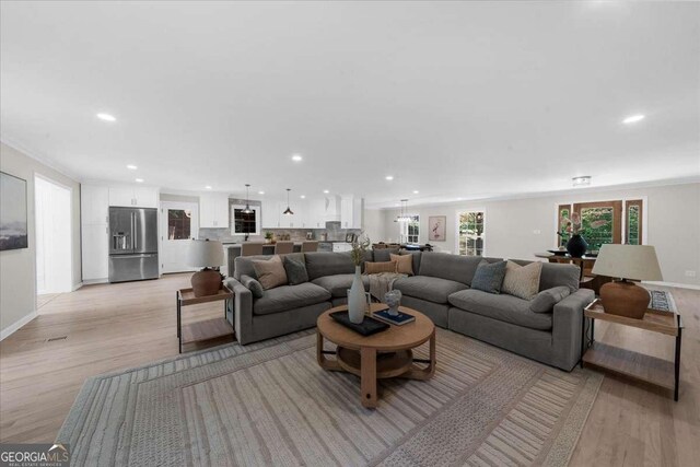 7300 Wynhill Dr, Sandy Springs, GA 30328 - living room with recessed lighting, light wood-style floors, and baseboards