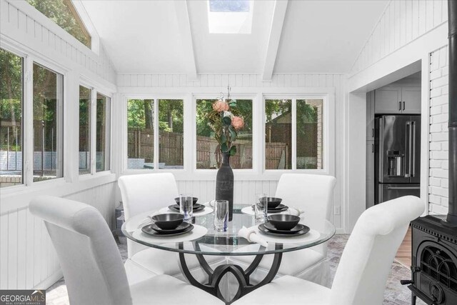 7300 Wynhill Dr, Sandy Springs, GA 30328 - sunroom with lofted ceiling with beams and plenty of natural light
