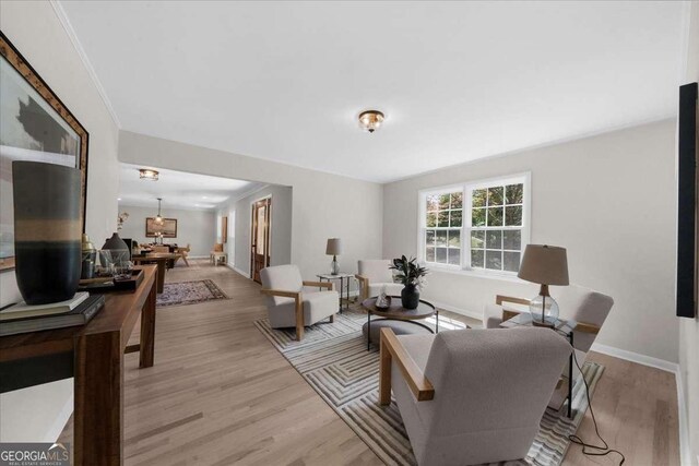 7300 Wynhill Dr, Sandy Springs, GA 30328 - living area with light wood-type flooring and baseboards