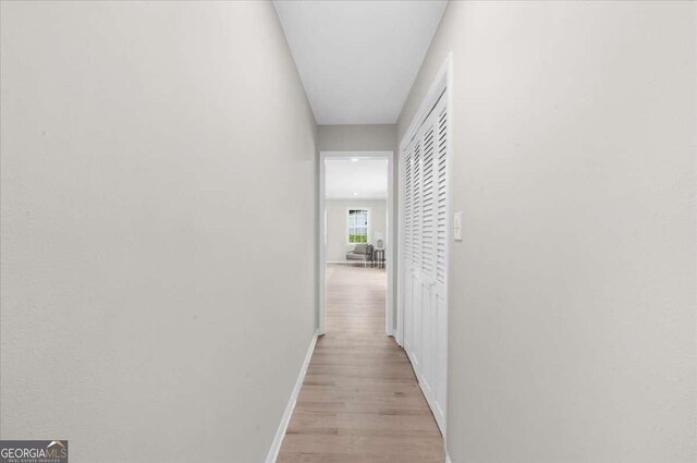 7300 Wynhill Dr, Sandy Springs, GA 30328 - corridor featuring baseboards and light wood-style floors