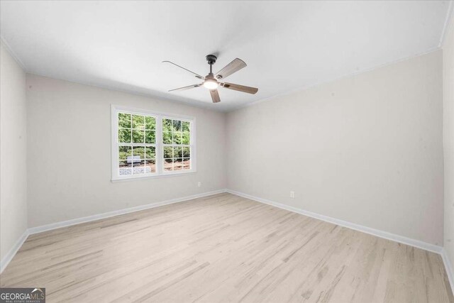 7300 Wynhill Dr, Sandy Springs, GA 30328 - empty room with ceiling fan, baseboards, and light wood-style flooring