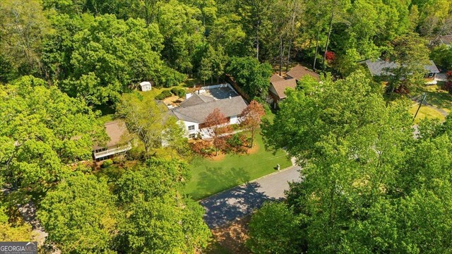 7300 Wynhill Dr, Sandy Springs, GA 30328 - birds eye view of property featuring a forest view