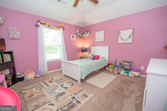 carpeted bedroom featuring ceiling fan, baseboards, and visible vents