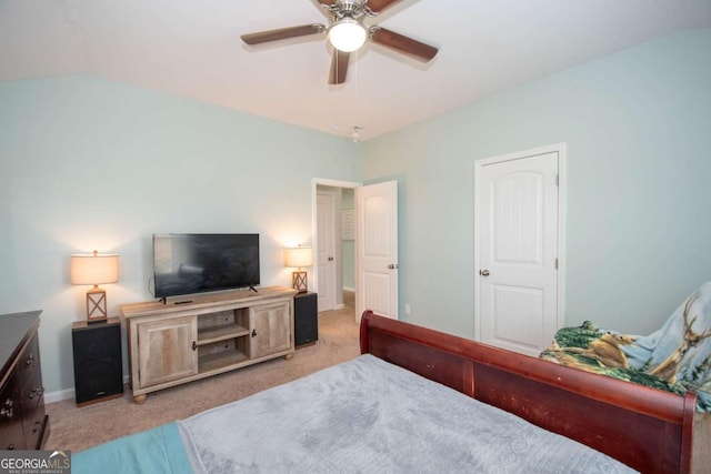 bedroom with light carpet, baseboards, and ceiling fan