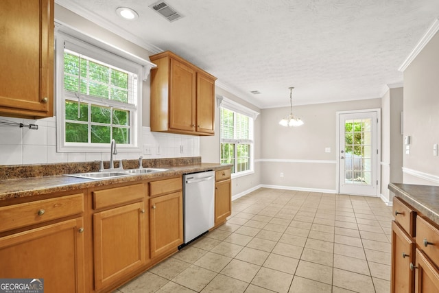 kitchen featuring visible vents, a sink, dishwasher, and dark countertops