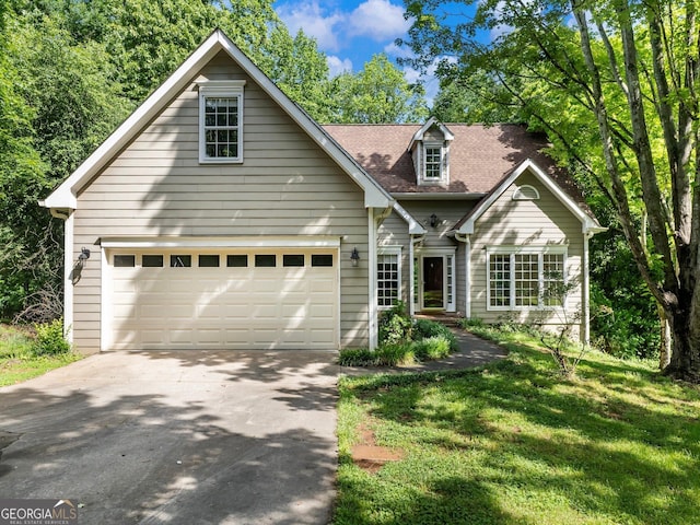 6212 Germantown Dr, Flowery Branch, GA 30542 - view of front of home featuring driveway, a front lawn, and a shingled roof