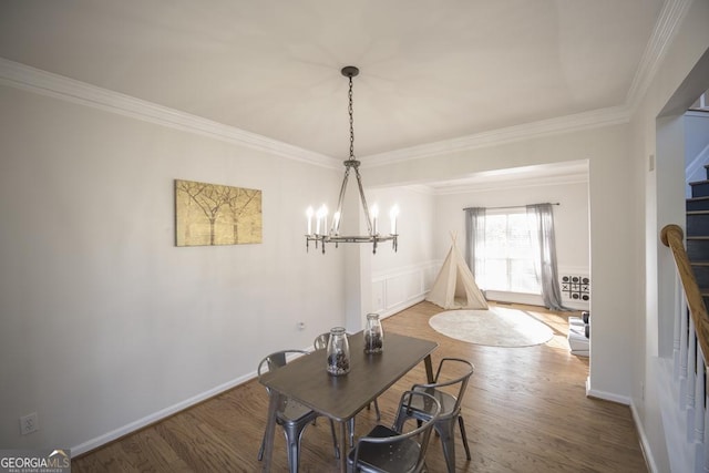 2019 Chelton Way SE, Smyrna, GA 30080 - dining room featuring ornamental molding, stairway, a chandelier, wood finished floors, and baseboards