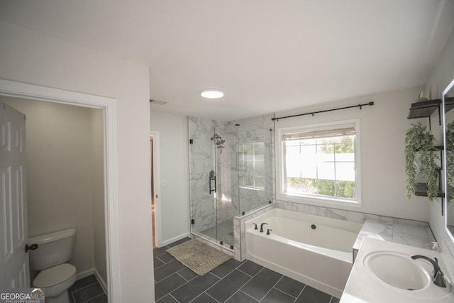 2019 Chelton Way SE, Smyrna, GA 30080 - bathroom with toilet, a shower stall, a bath, a sink, and tile patterned floors