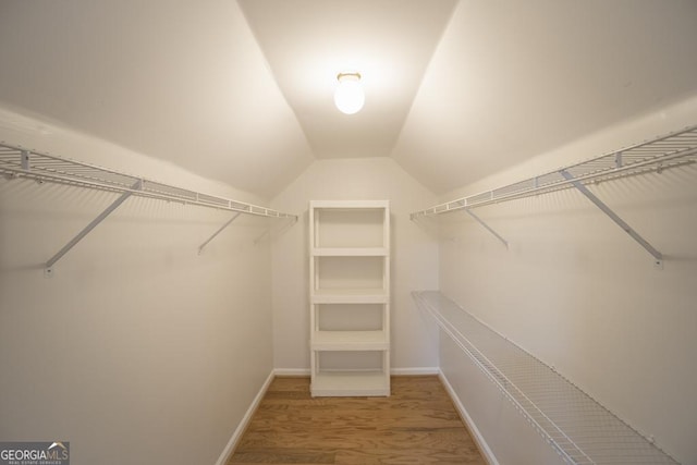 2019 Chelton Way SE, Smyrna, GA 30080 - walk in closet with lofted ceiling and wood finished floors
