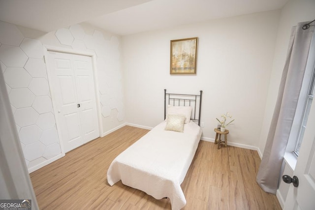 2019 Chelton Way SE, Smyrna, GA 30080 - bedroom featuring light wood-style flooring and baseboards
